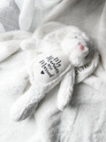 Dog engagement announcement bunny toy in white, styled in a home setting, custom pet wedding gift.
