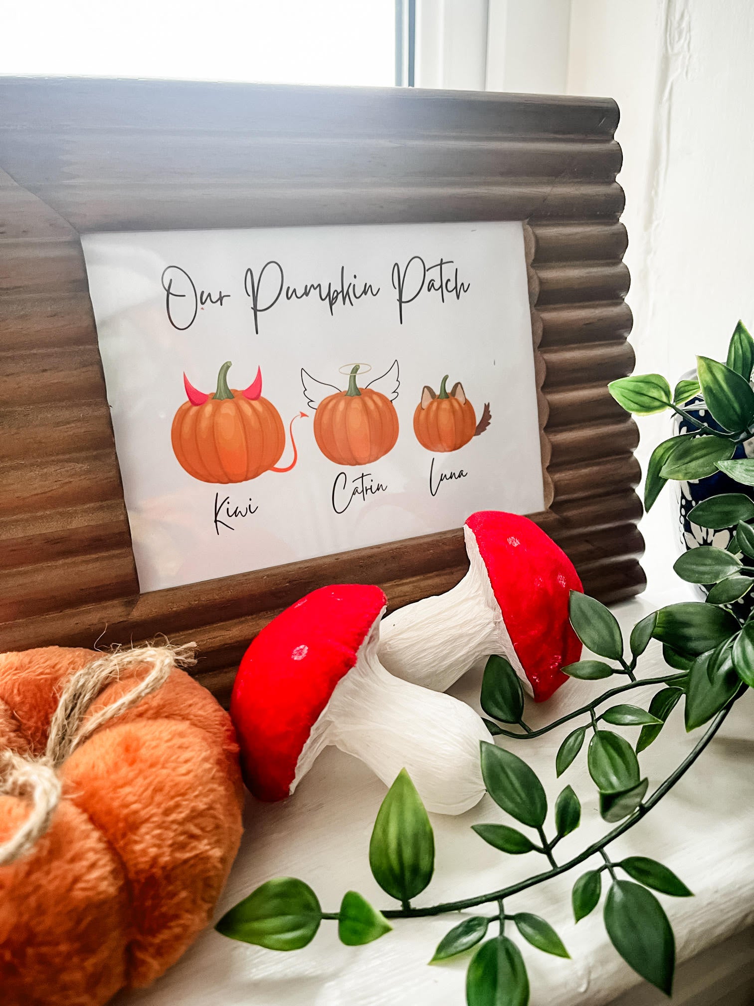 Personalised autumn family print with three pumpkins. Cosy seasonal home decoration and family keepsake.