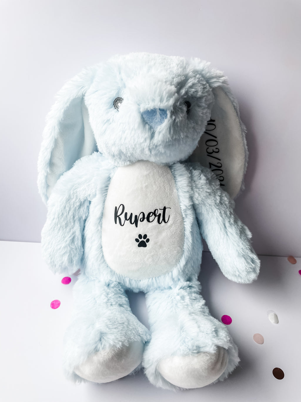 Blue personalised birthday bunny customised with dog's name and birth date. Thoughtful dog birthday keepsake.