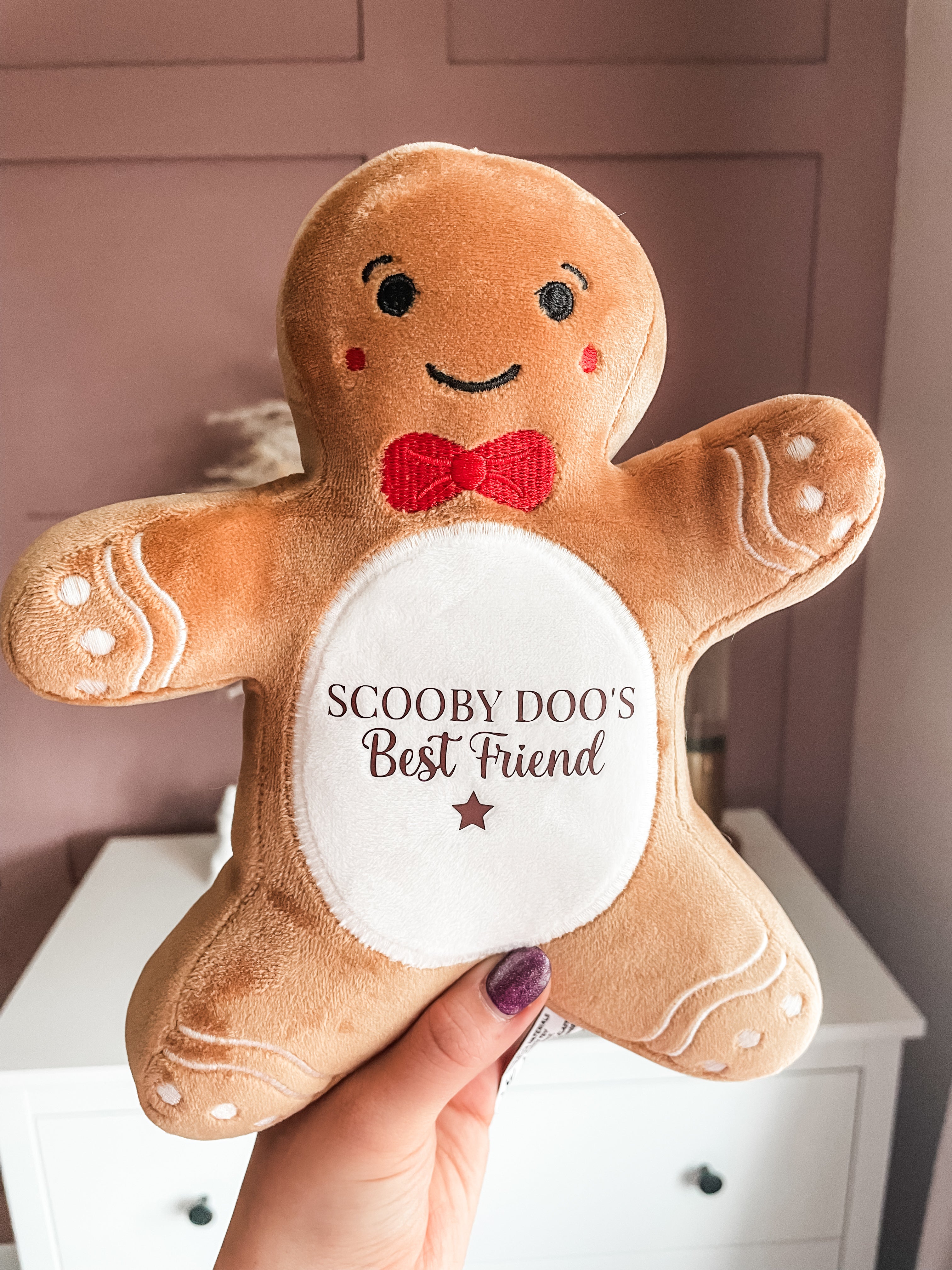 Custom gingerbread dog toy with personalised name and the sweet text "best friend" underneath. Festive Christmas dog gift and stocking filler.