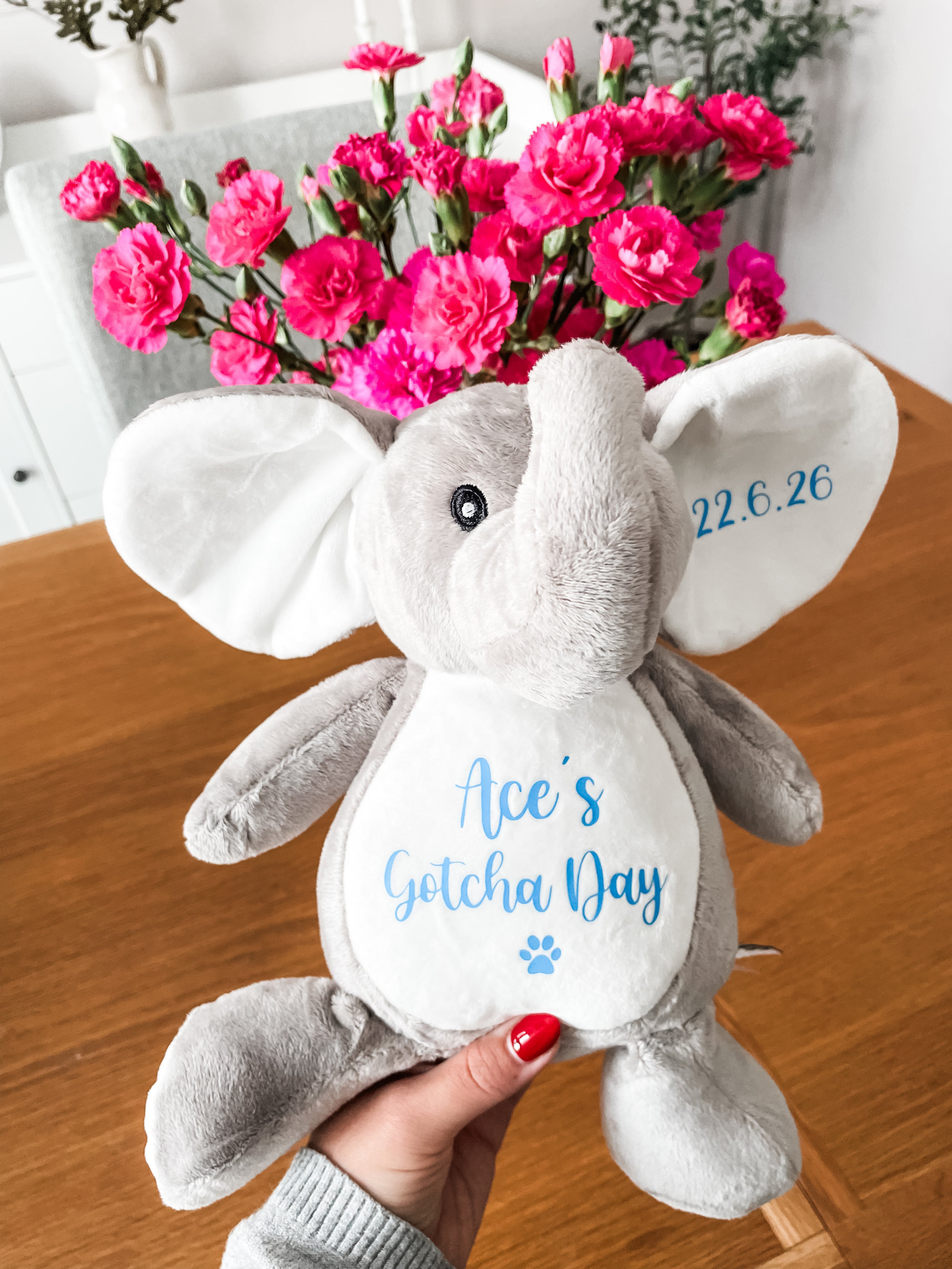 Personalised elephant cuddly toy celebrating a dog's Gotcha Day with custom name and date.