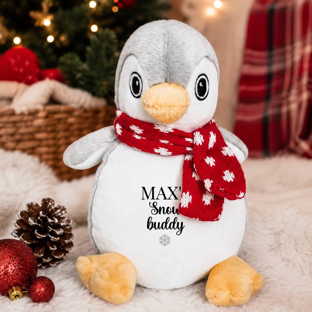Personalised penguin Christmas dog toy personalised with your dog's name. Festive Christmas gift for dogs and puppies.