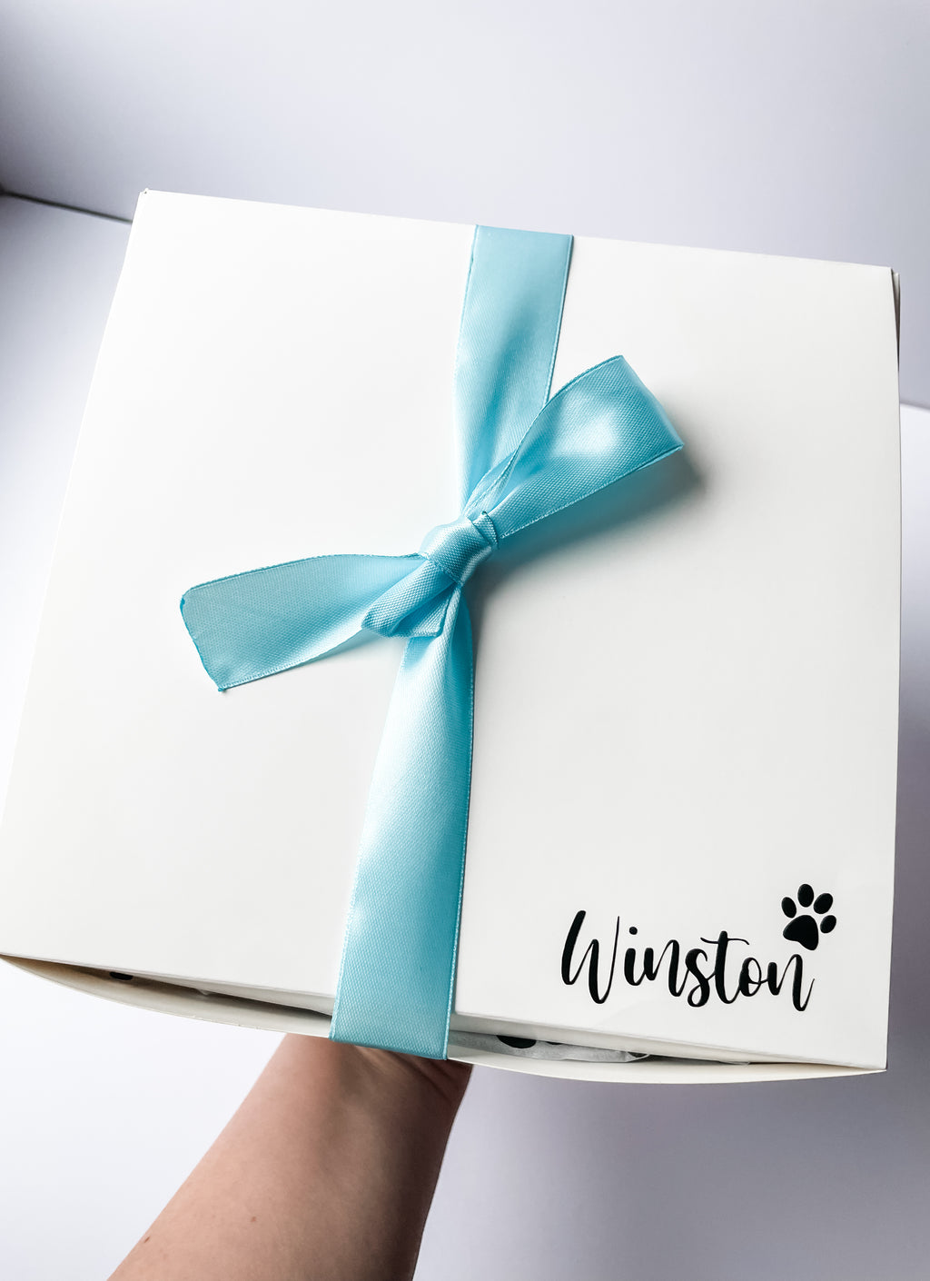 Luxury blue theme dog birthday hamper gift box with satin ribbon, personalised with dog name.