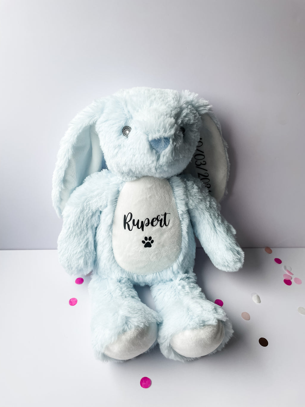Personalised blue bunny toy for dog's with custom name and birthday date text. Custom boy dog birthday toy.