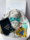 Personalised dog birthday hamper with bunny toy, birthday hat, treats and gift box. Luxury personalised dog birthday gift.