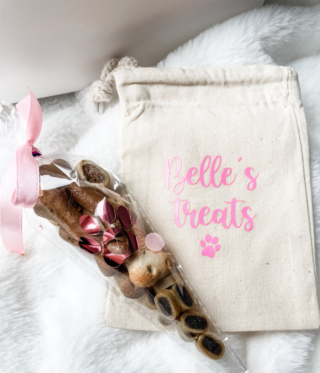 Personalised dog treat bag and birthday treat cone included inside a luxury personalised birthday hamper. Custom dog treats.