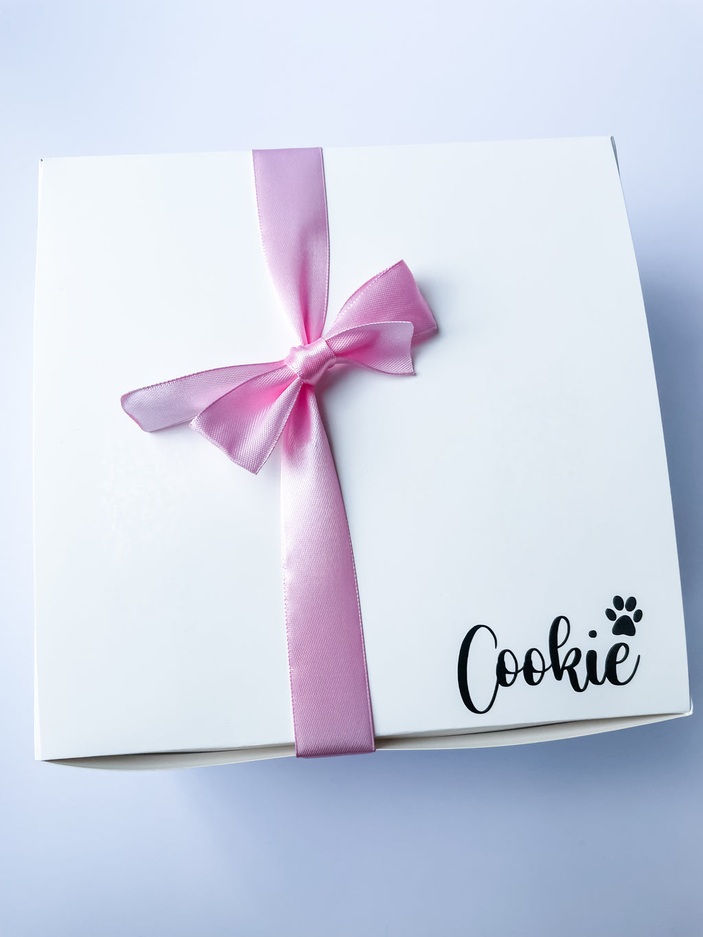 Luxury personalised dog birthday gift box with satin ribbon and personalised dog toy. Custom dog 1st birthday gift.