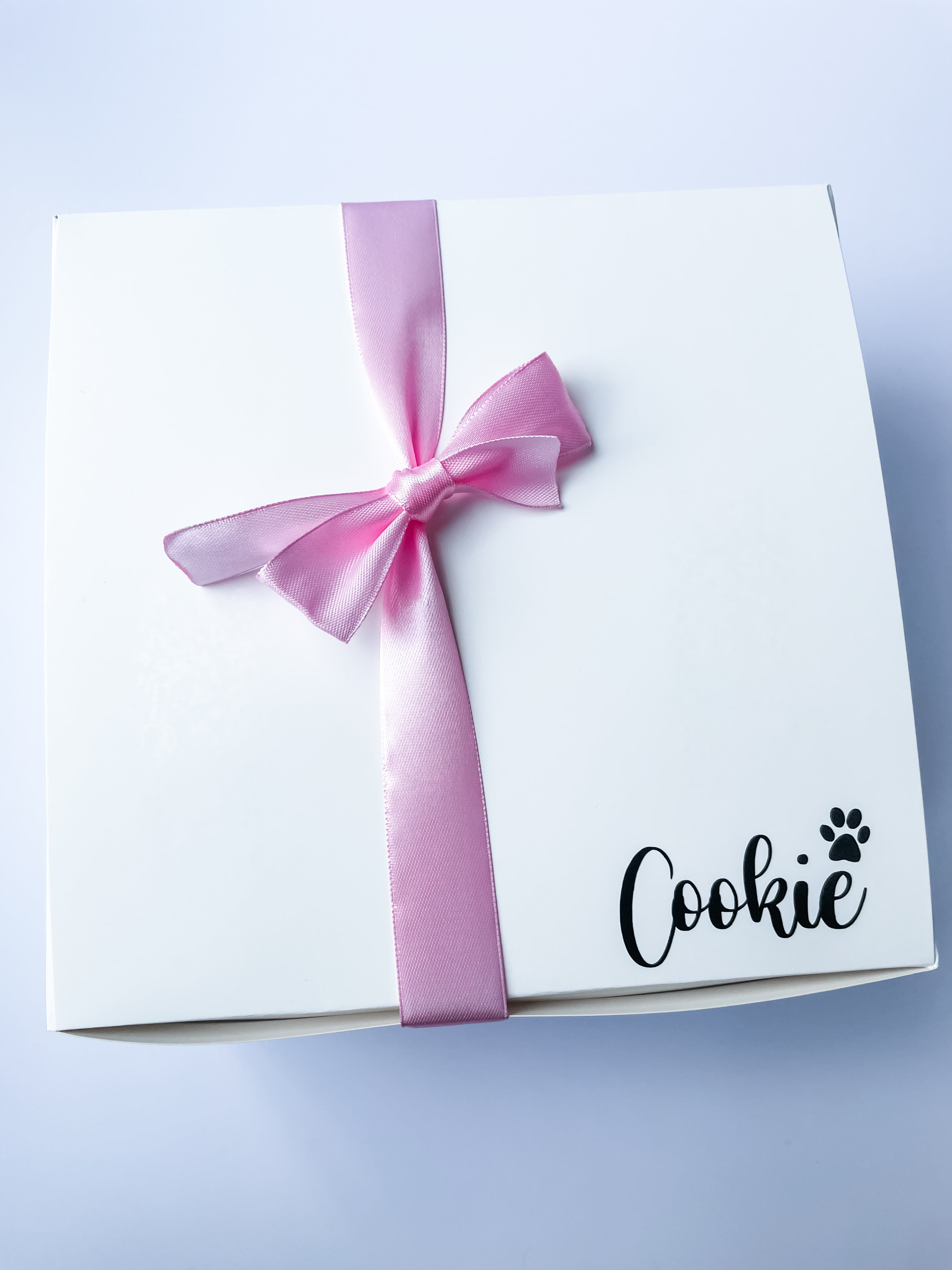 Luxury personalised dog birthday gift box with satin ribbon and personalised dog toy. Custom dog 1st birthday gift.
