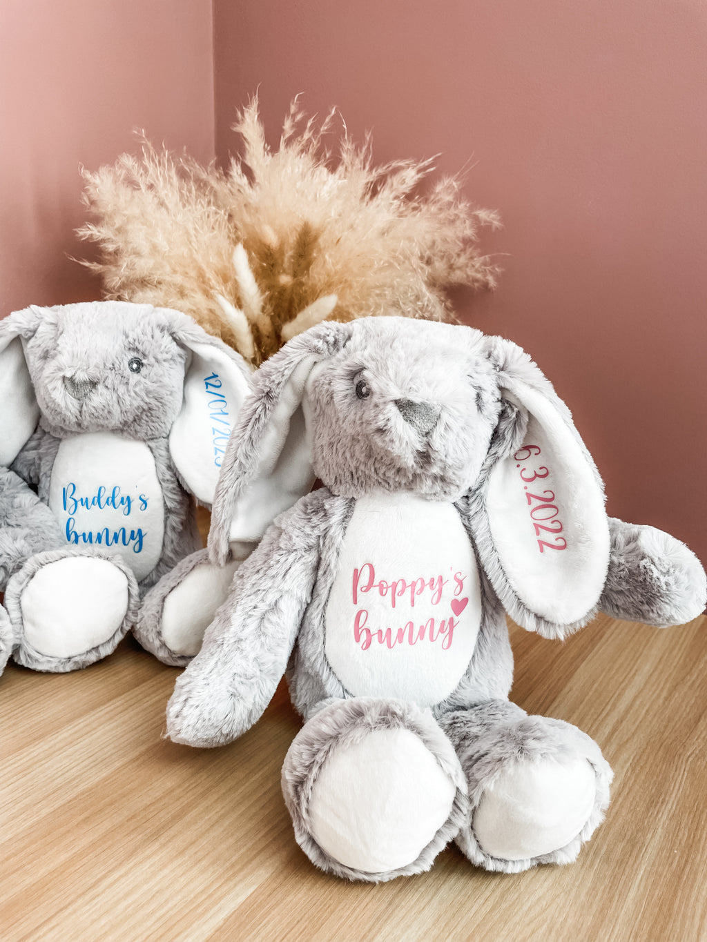 Two personalised bunny dog toys with custom names and birthday dates. Custom dog toys.
