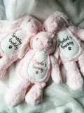 Three personalised Easter bunny dog toys in pink. Beautiful Easter gifts for dogs personalised with your dog's name.