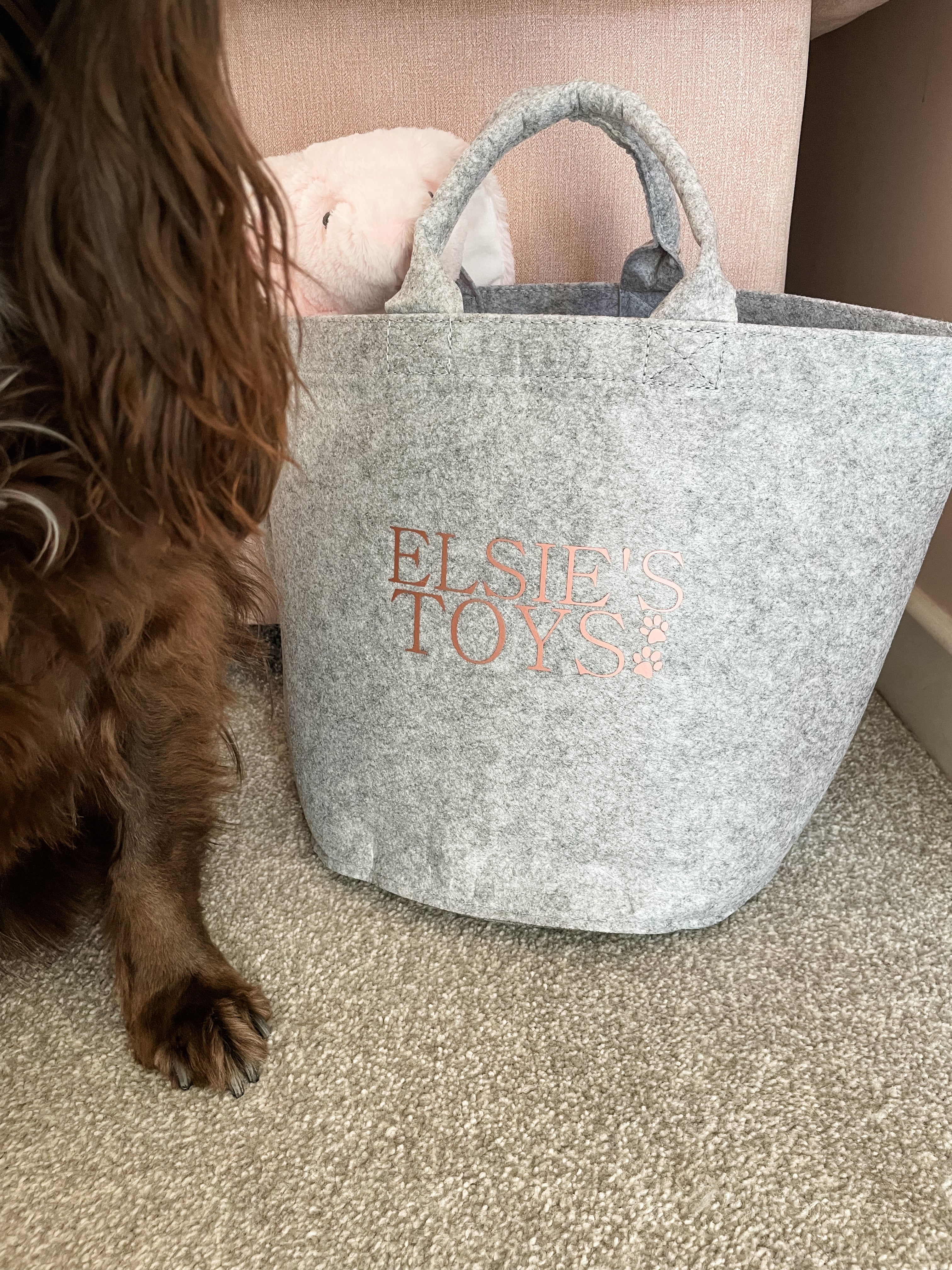 Grey personalised dog toy storage basket with custom name, perfect for keeping dog toys organised.