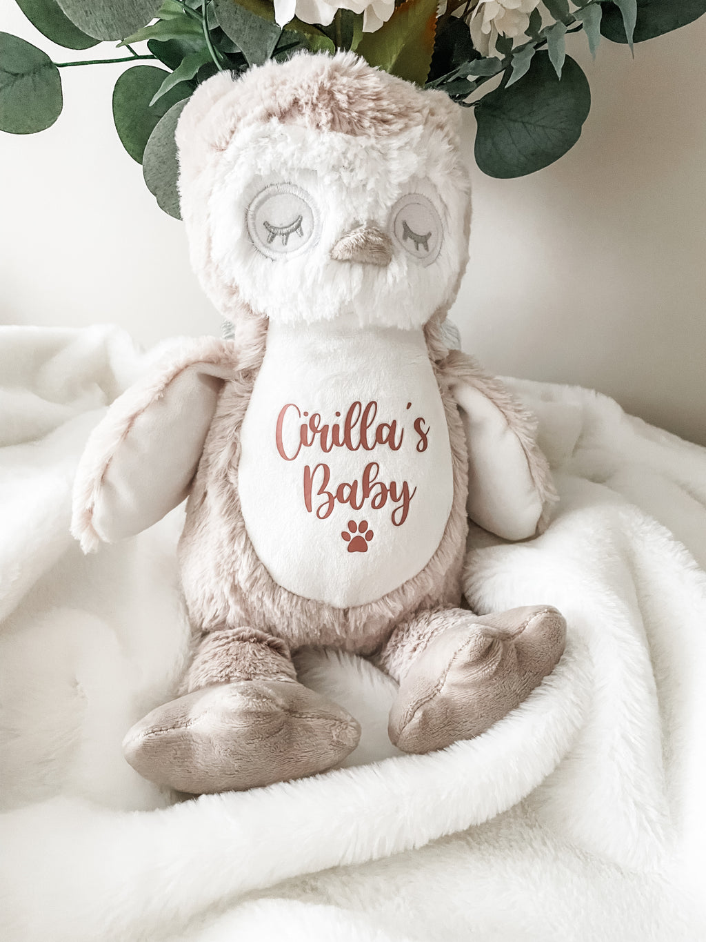 Personalised plush cat toy in an owl design styled in a home setting, showing cat name detail. Custom made cat toy.