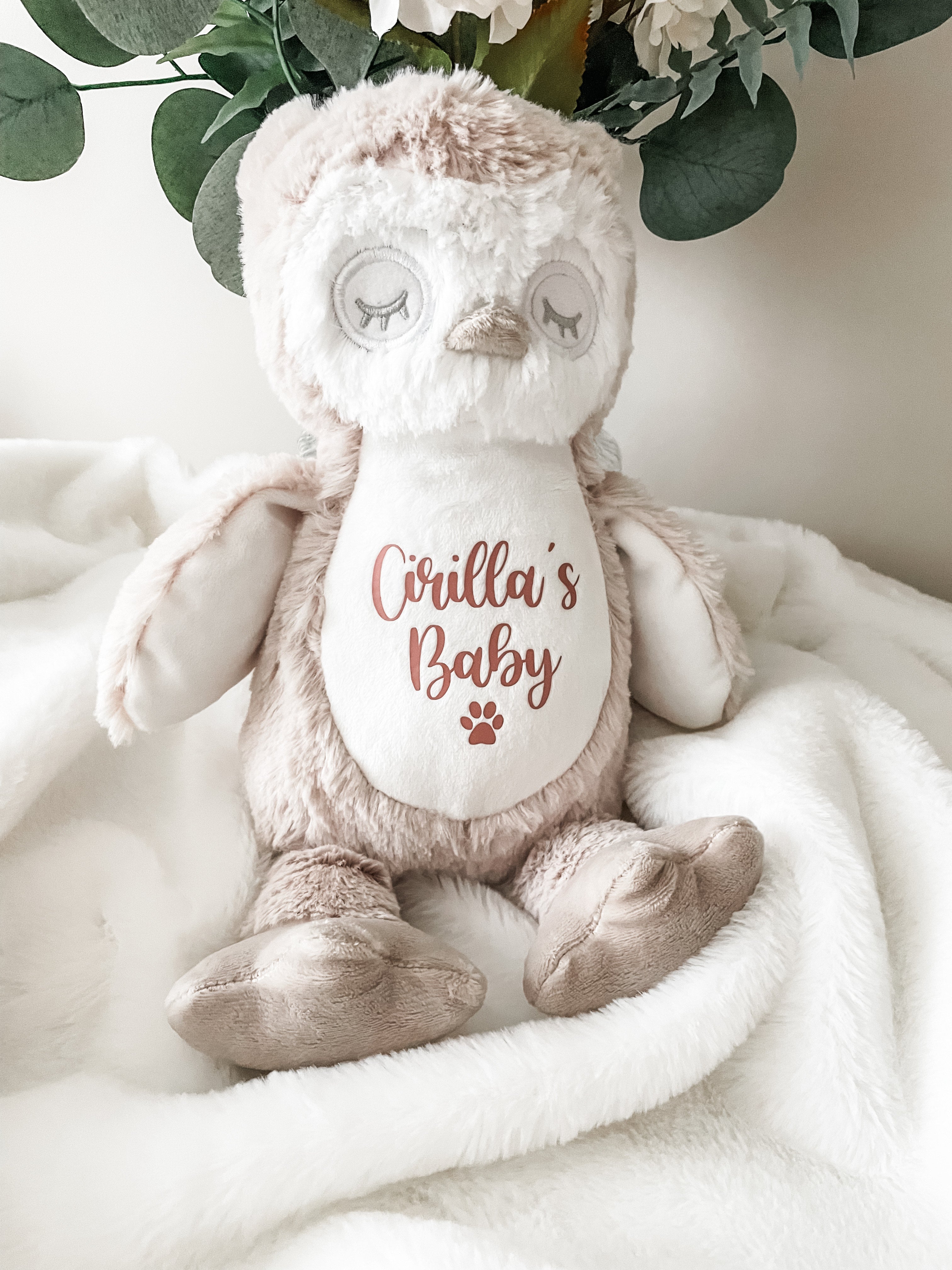 Personalised plush cat toy in an owl design styled in a home setting, showing cat name detail. Custom made cat toy.