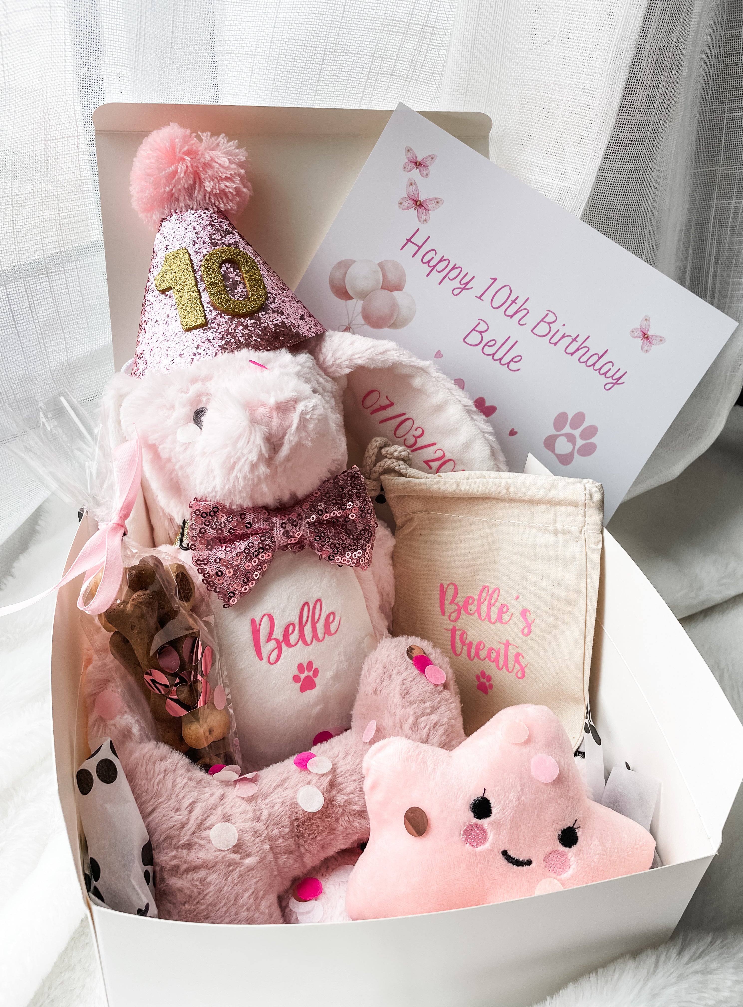 Personalised birthday hamper for dogs with personalised soft bunny and pink plush dog toys. Girl dog birthday gift.