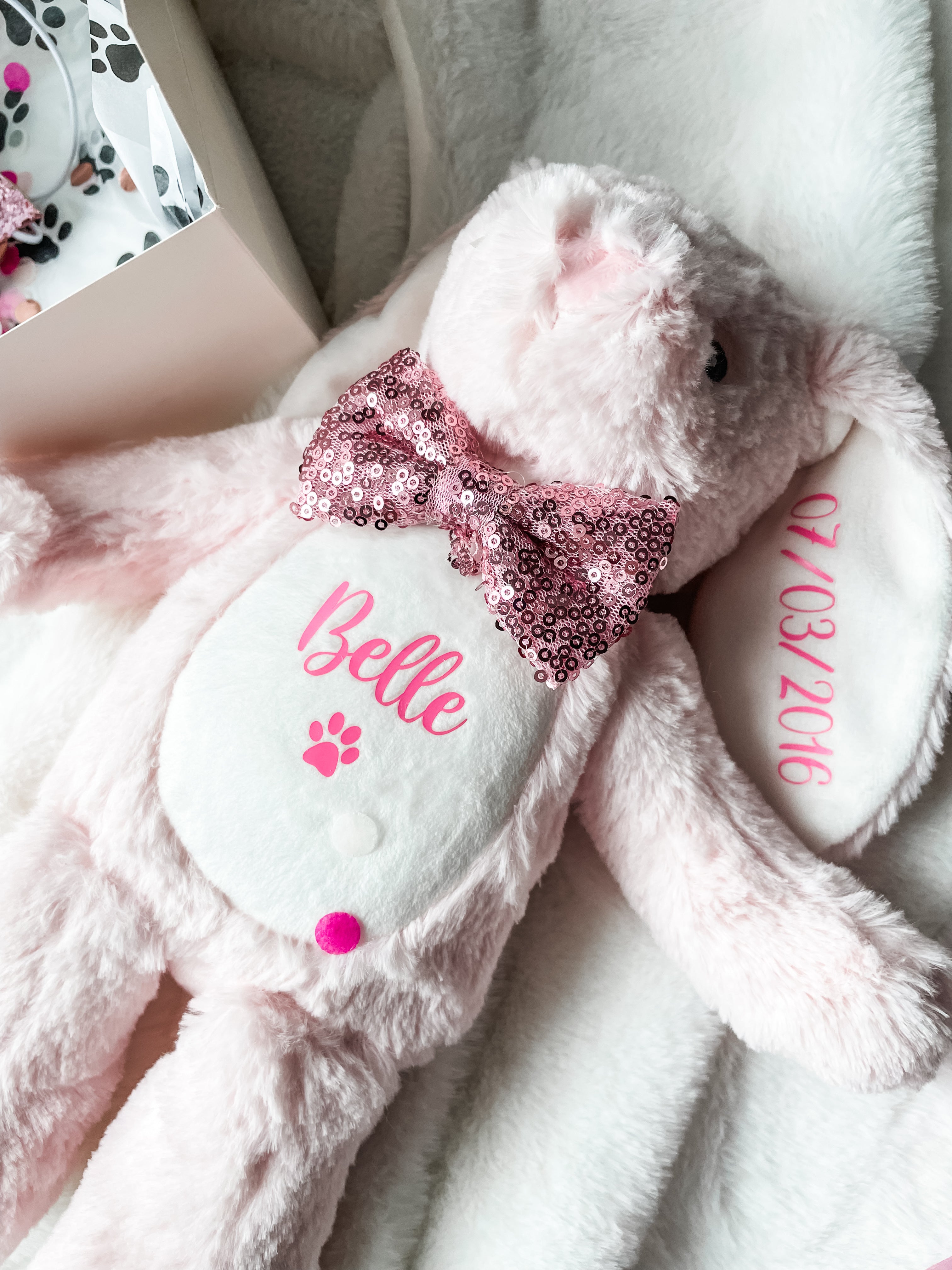 Pink personalised birthday bunny customised with dog's name. Soft personalised dog birthday toy.