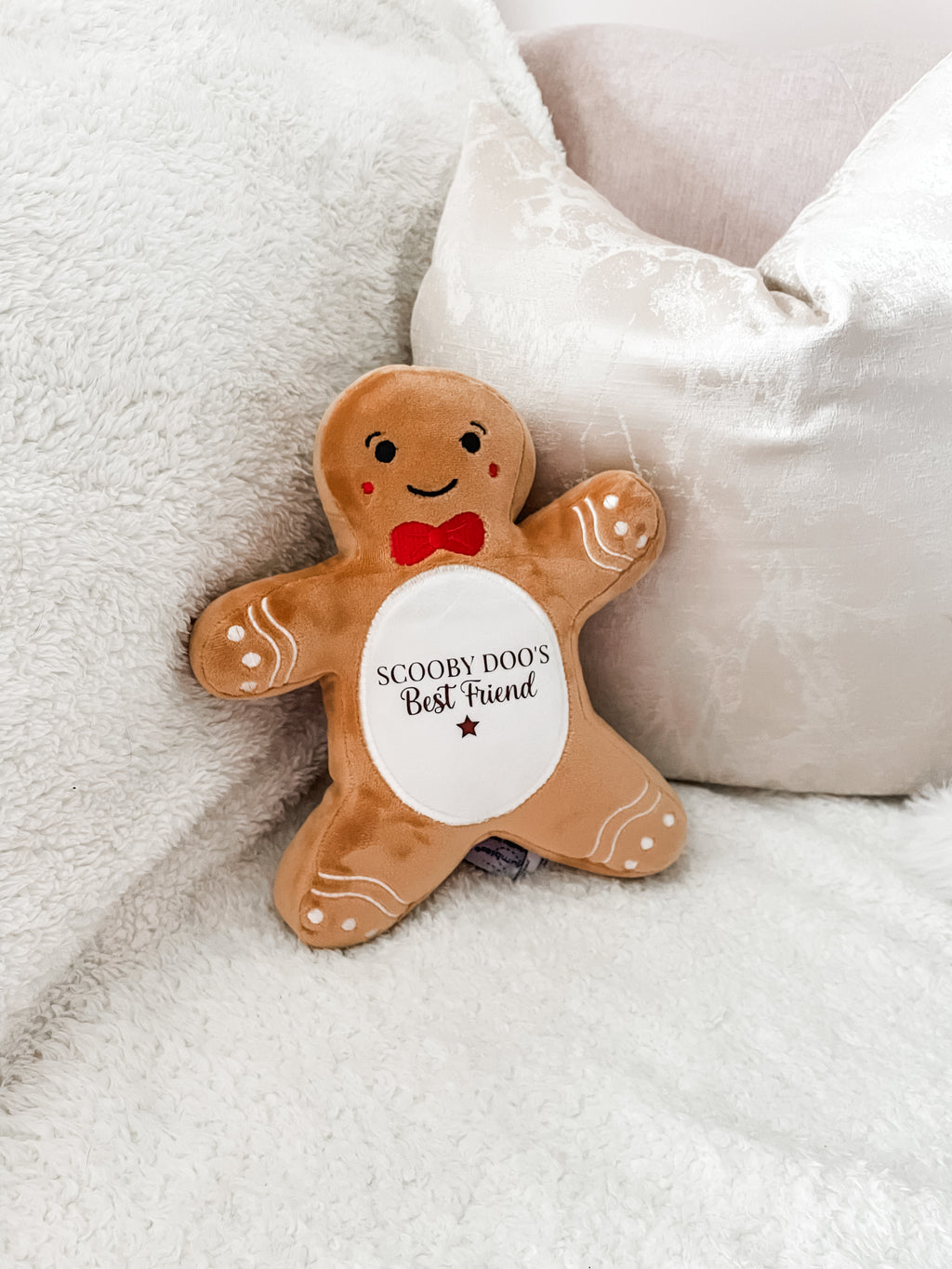 Personalised Christmas dog toy with gingerbread design in a festive home, Christmas Eve box gift for dogs and puppies.