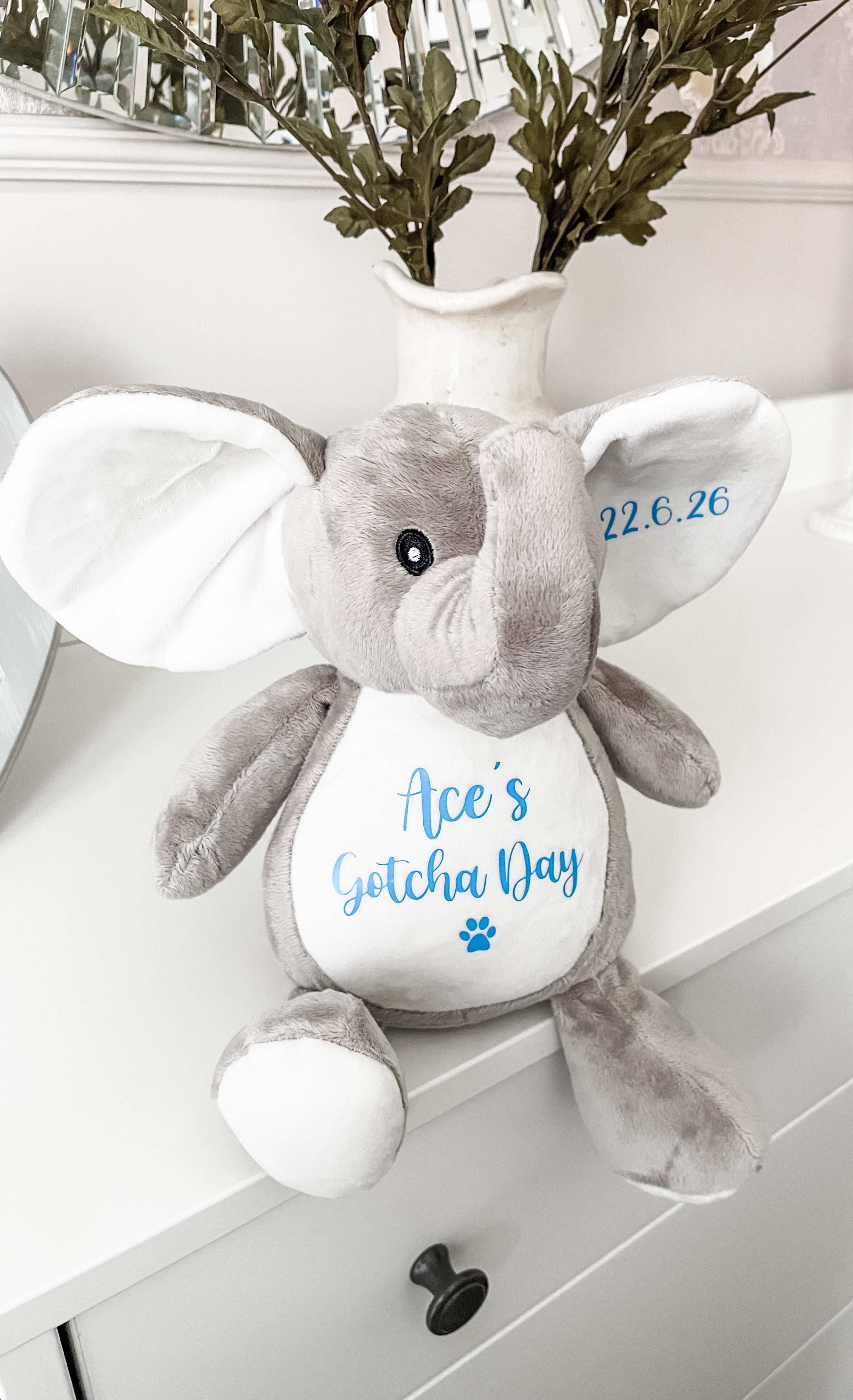 Personalised elephant Gotcha Day toy showing custom dog name and adoption date. Thoughtful forever home gift.