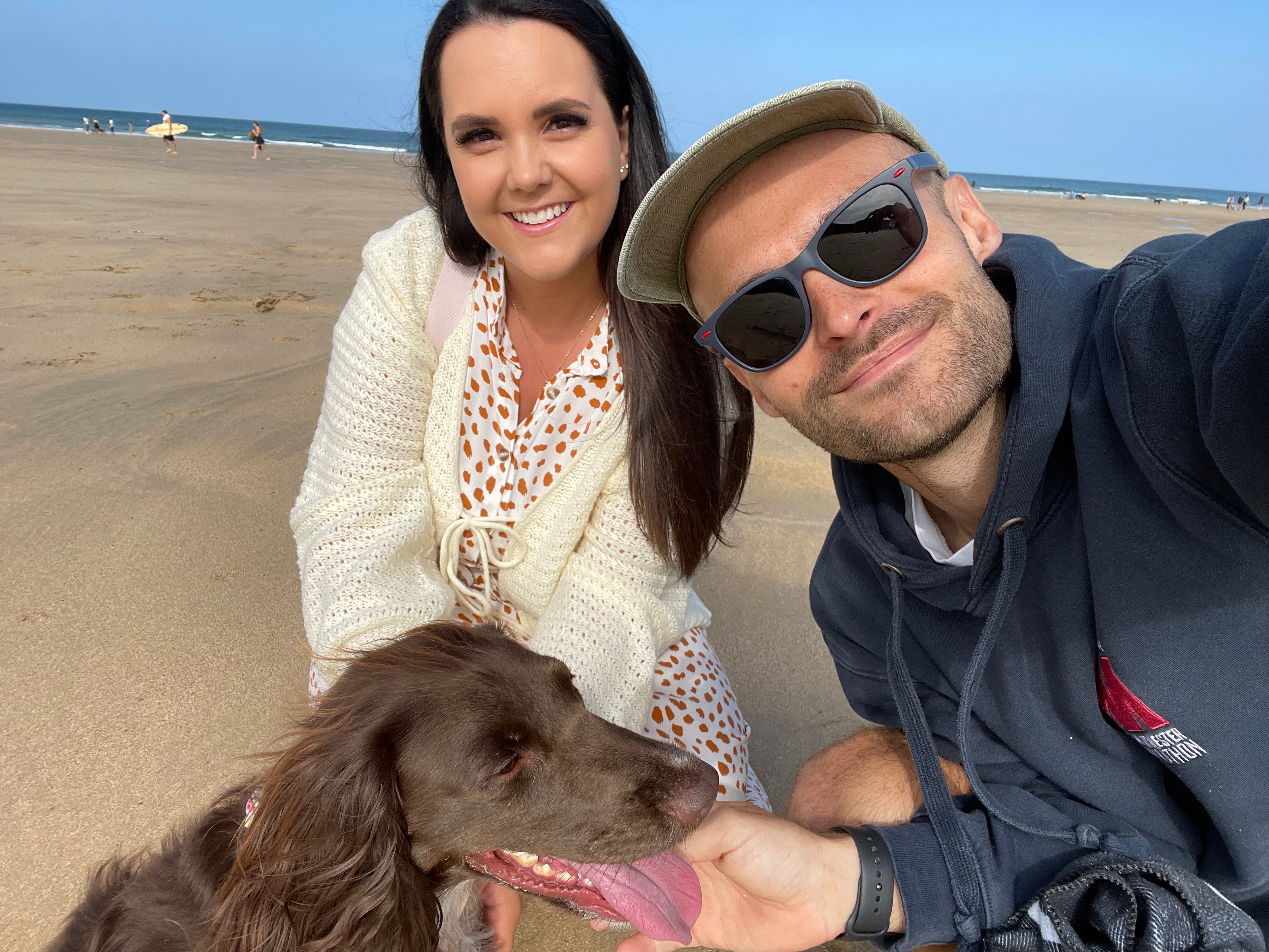 Small family business owners Rebecca and Damien with their cocker spaniel Bella creating personalised gifts in Shropshire